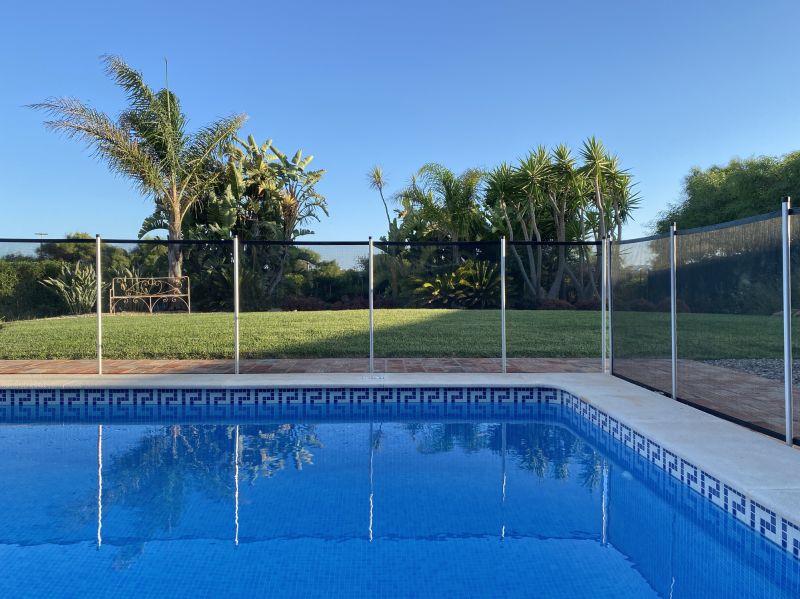 Mesh Fence Installed Along Pool Edge